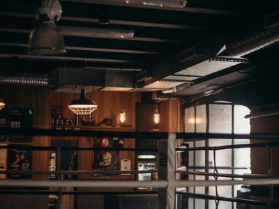 Empty modern industrial style gym with natural light.